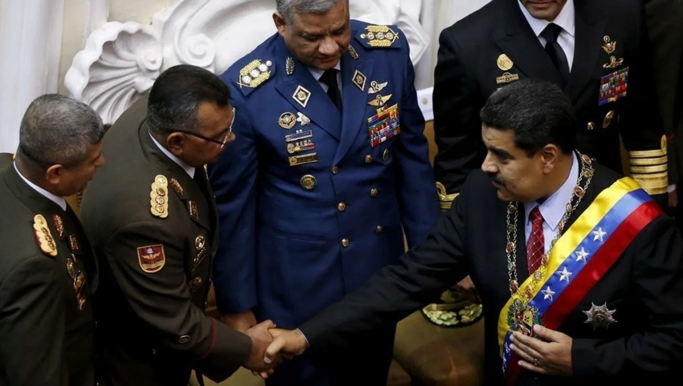 Nicolas Maduro con el minitro Reverol que informó sobre el trágico episodio.
